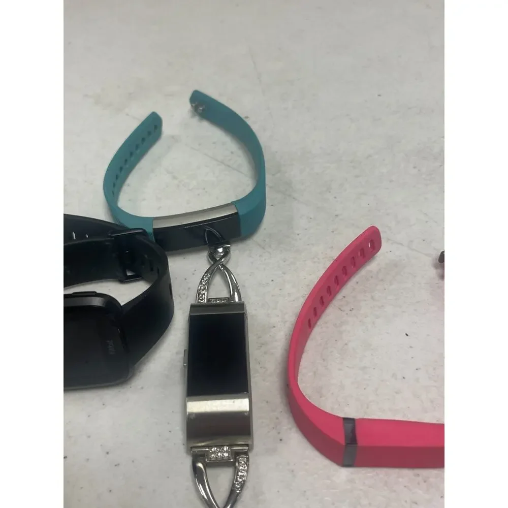 Lot of 7 Fitbit Mixed Brands Activity Tracker Smart Watches Untested For Parts